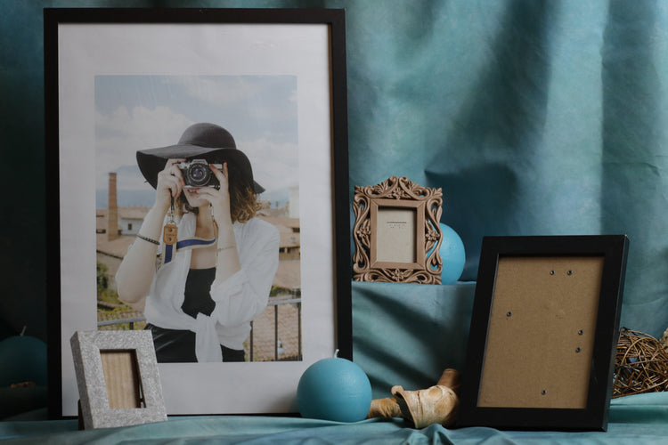 colored pencil line art, blue background, framed in white matboard with a black wooden picture frame
